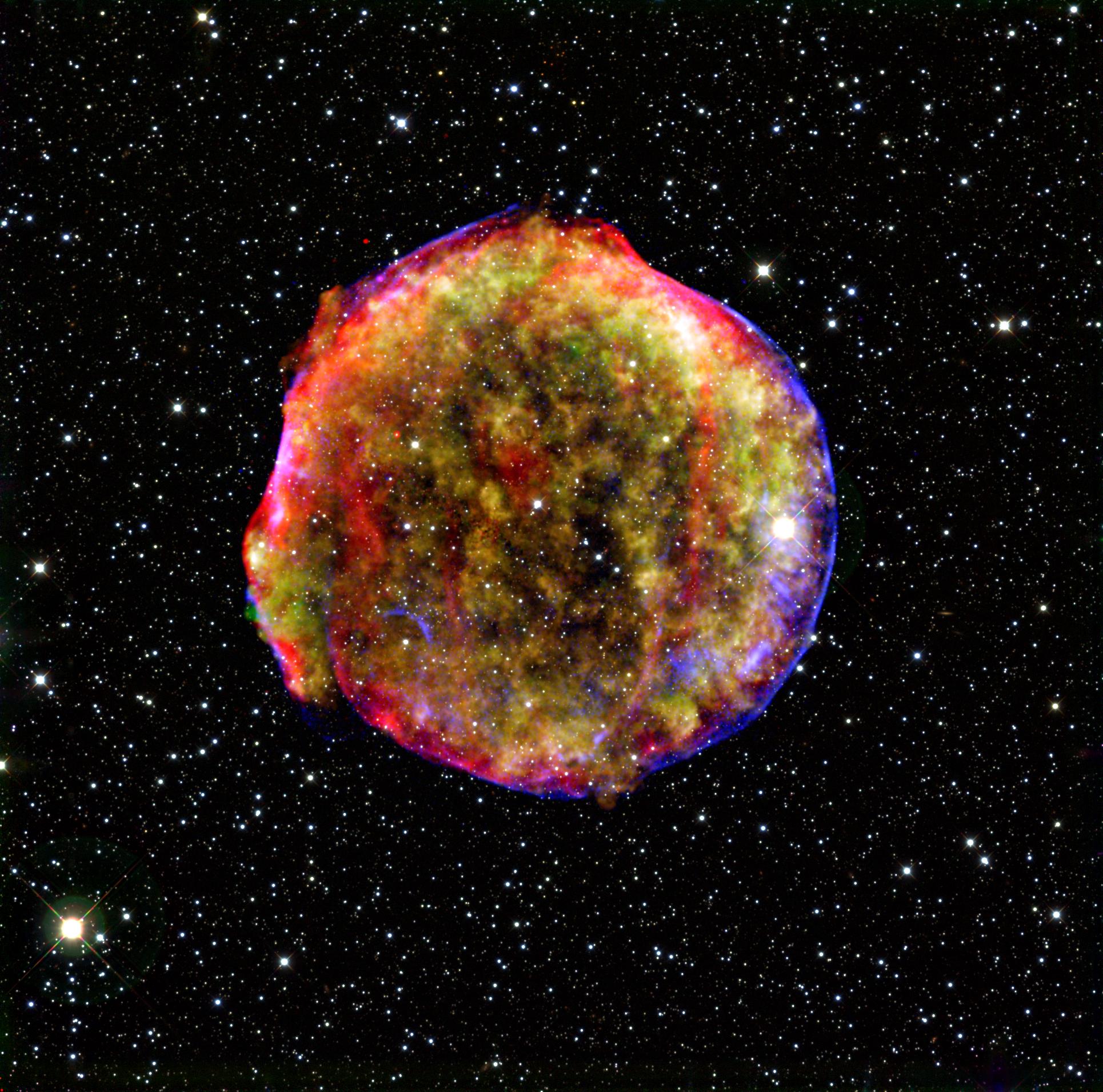 Multiwavelength composite image of the remnant of Tycho's supernova, SN 1572. Photo credit: NASA/MPIA/Calar Alto Observatory, Oliver Krause et al.