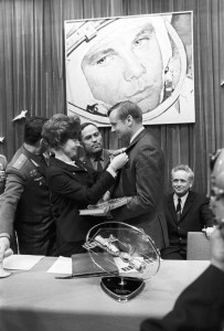 Valentina Tereshkova, presenting a badge to U.S. astronaut Neil Armstrong in memory of his visit to the Gagarin Cosmonaut Training Center in Star City.