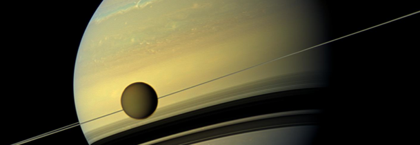 Titan against Saturn. Credit: NASA