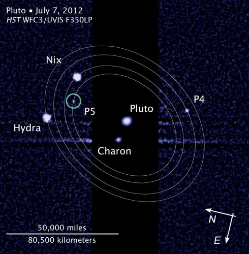This image, taken by the NASA/ESA Hubble Space Telescope, shows five moons orbiting Pluto, the distant, icy dwarf planet (ESA/Hubble/AFP/Showalter)